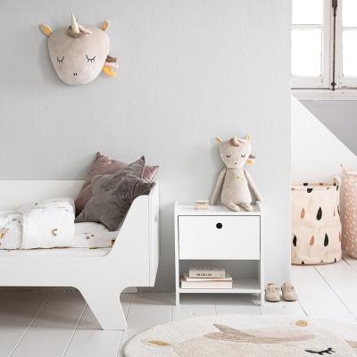 FROM COT TO BED