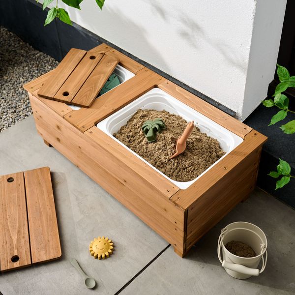 Kids outdoor bench with integrated play features from Petite Amélie 