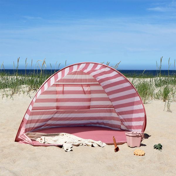 Uv pop up tent in pink for children at beach from Petite Amélie