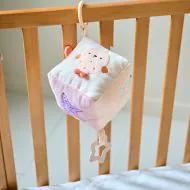 Activity cube for babies in soft peach from Petite Amélie