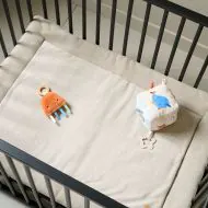 Baby play mat in beige 70x96 cm for foldable playpen made of organic cotton from Petite Amélie