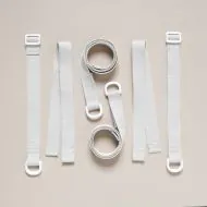 Bedside crib extension strap to attach it to a boxspring bed from Petite Amélie