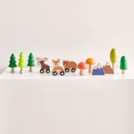 Wooden train accessories in natural wood finish from Petite Amélie